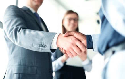 business people shaking hands